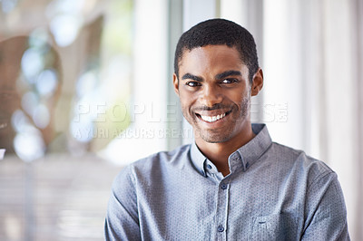 Buy stock photo Happy black man, portrait and window with ambition for career, job or creative startup at office. Face of African male person or employee with smile in confidence for expertise or positive mindset