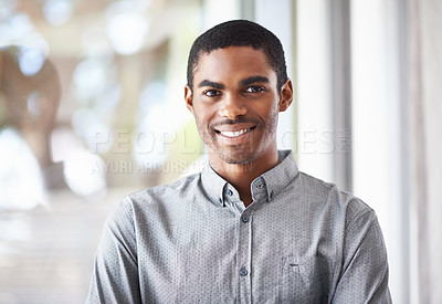 Buy stock photo Happy black man, portrait and window with confidence or ambition for career, job or creative startup at office. Face of African male person or employee with smile for expertise or positive attitude