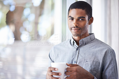 Buy stock photo Black man, portrait and window with coffee for morning, beverage or creative startup at the office. African male person with smile for latte, cappuccino or cup of tea by glass wall at the workplace
