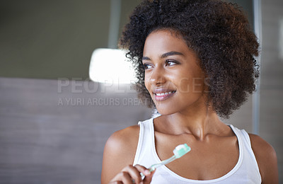 Buy stock photo African woman, brushing teeth and happy in bathroom for oral wellness, health and benefits for mouth in home. Girl, person and toothbrush with thinking, cleaning and toothpaste for results in house