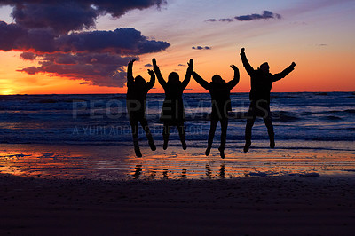 Buy stock photo Sunset, beach and silhouette of jumping friends in nature, freedom and celebrating travel outdoor. Shadow, jump and group of people at the ocean at sunrise for adventure, celebration or sea vacation