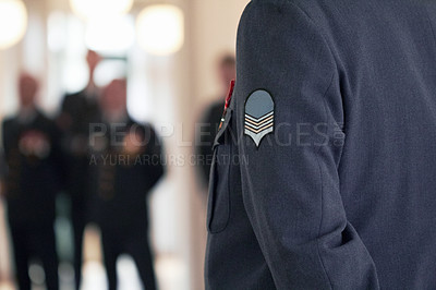 Buy stock photo Shot of a military badge on a high ranking officer's jacket