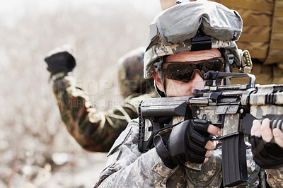 Buy stock photo Cropped shot of a military sniper taking aim]