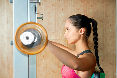 Buy stock photo Profile, woman and barbell exercise in gym for power, workout and strong bodybuilding with focus. Serious female athlete, weights and fitness training for healthy muscles, sports and strength in club