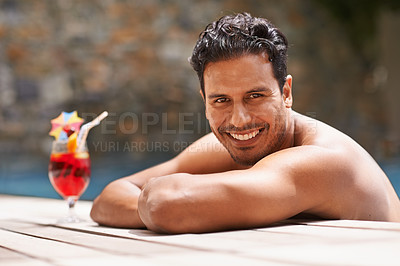Buy stock photo Man, relax and portrait at swimming pool with cocktail at hotel, resort and travel on luxury vacation. Summer, holiday and glass of alcohol to drink with happiness on deck at poolside in Mexico