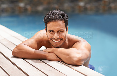 Buy stock photo Happy, portrait and man relax in pool on vacation in summer with happiness at hotel, resort or villa in Miami. Calm, holiday and person in water at deck in sunshine with smile from travel in Florida