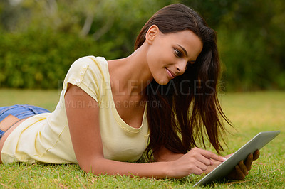 Buy stock photo Relax, happy and woman with tablet on grass surfing social media website with 5g connection. Nature, technology and internet wifi, girl with smile and digital touchpad in hands on field or garden.