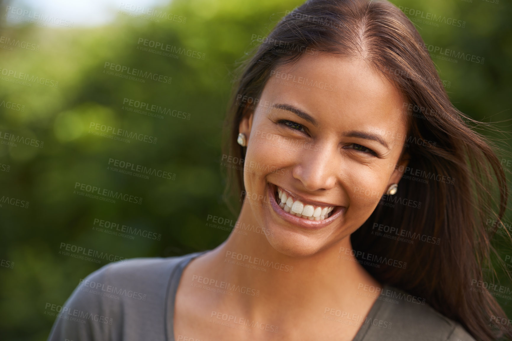 Buy stock photo Portrait, happy and woman in a park for travel, adventure or calm morning walk in nature. Face, smile and female person relax outdoor with sunshine, fresh air and confidence, break and feel good mood