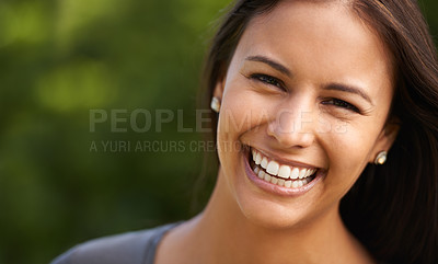 Buy stock photo A beautiful young woman smiling outdoors