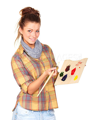 Buy stock photo Studio portrait of an attractive young woman holding a brush and easel isolated on white