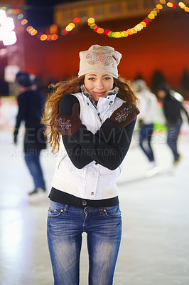 Buy stock photo Woman, ice rink and portrait on cold night with self hug, training and exercise on winter holiday. Young girl, skate and freezing body with warm clothes for mistake, outdoor and regret on vacation