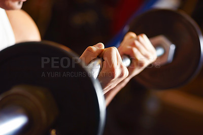 Buy stock photo Handsome sportive man at the gym doing exercises