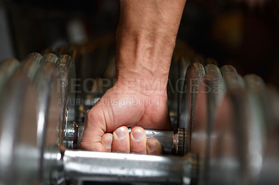 Buy stock photo Hands, dumbbell workout and strong man doing power exercise, club fitness or bodybuilding training. Health commitment, gym equipment and body builder, person or male athlete with steel metal dumbell