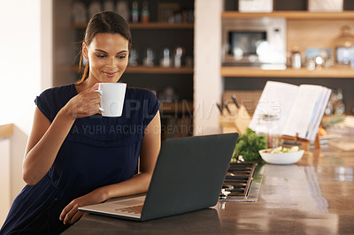 Buy stock photo Woman, laptop and drinking coffee in kitchen for online communication for email, internet or remote work. Female person, caffeine and freelance journalist for planning research, report or proposal