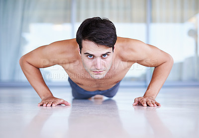 Buy stock photo Man, portrait and push up for fitness, muscle training with body and self care in apartment. Serious athlete, exercise and endurance in workout for health, wellness for sports and challenge at home