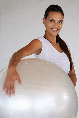 Buy stock photo Happy woman, portrait and training with exercise ball for workout, health and wellness at home. Young female person or yogi with smile for pilates, warm up or fitness in confidence with gym equipment