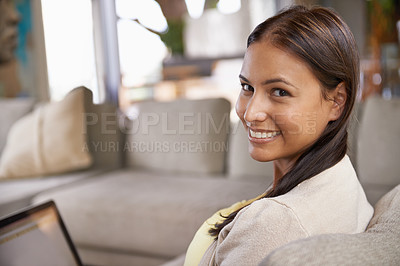 Buy stock photo Portrait, woman or laptop on couch on internet, website or social media for browsing in living room. Female person, smile and computer on sofa to relax, search and reading of email at weekend