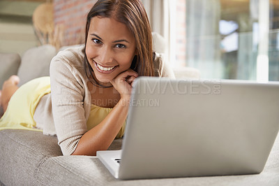 Buy stock photo Woman, laptop and relax on sofa with online planning, education and research for remote e learning. Portrait of happy person or student on a couch, home or living room with computer for subscription