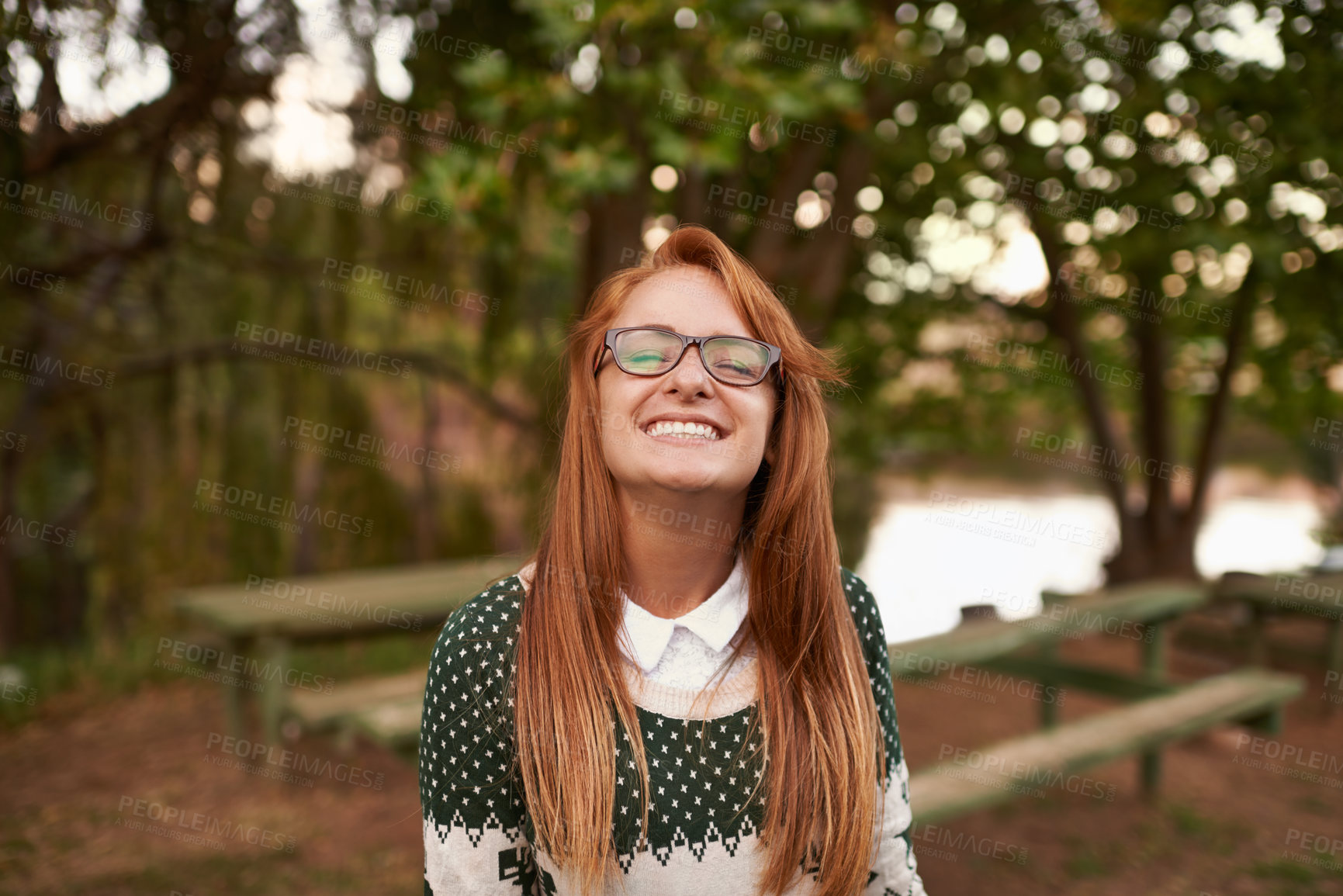 Buy stock photo Teen, girl and smile in outdoor nature, wellness and relax in woods or forest on summer holiday. Happy female person, trees and confidence in park or garden, calm and peace on travel to Amsterdam