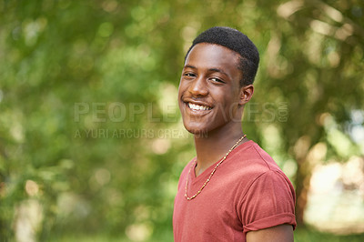 Buy stock photo Portrait of a handsome teenage boy standing in the outdoors
