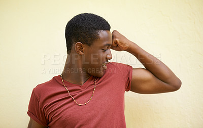 Buy stock photo Teenager, muscles and smile for strength, strong and proud indoor for growth and development in body. African Boy or young person with confidence for muscular, training or building up and active    