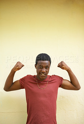 Buy stock photo African, portrait and student with smile, flex and happiness for youth and cool. Teenager, strong and positive with macho, identity and inspirational or motivation on wall background outdoors