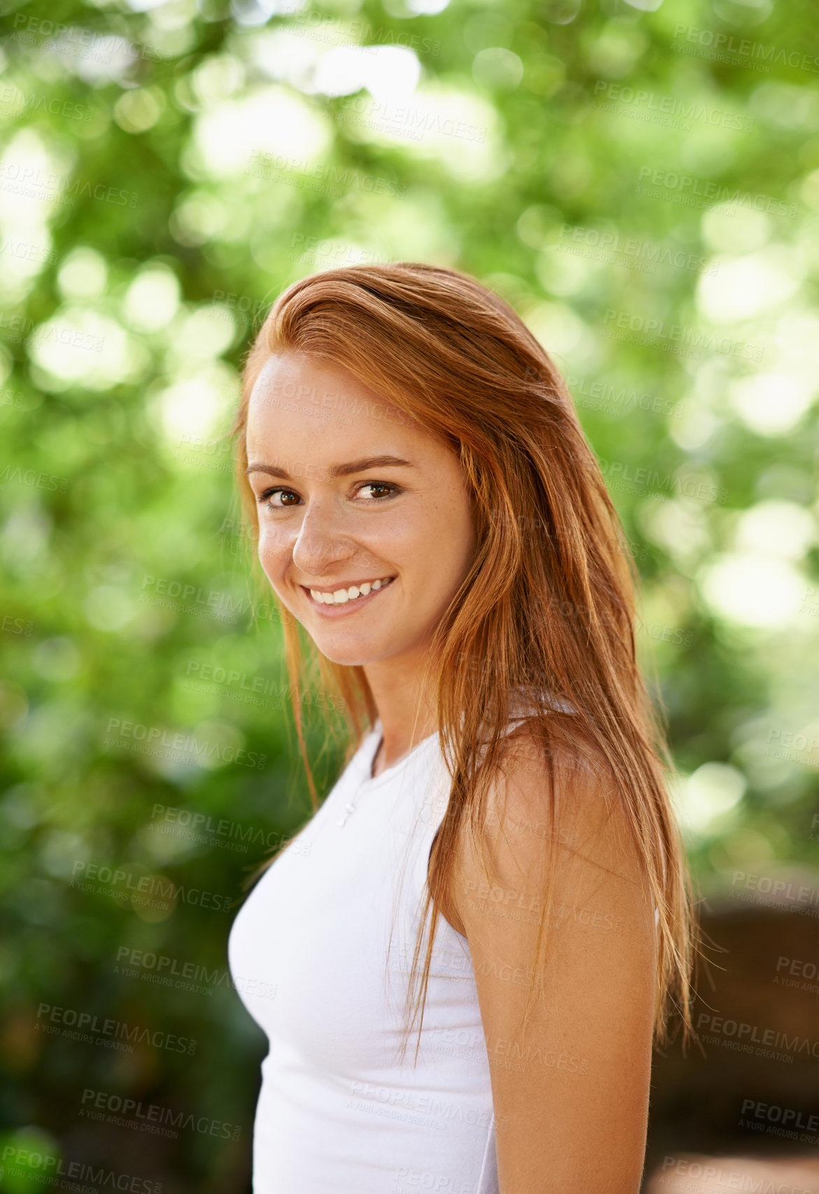 Buy stock photo Teen, girl and portrait in outdoor nature, smile and relax in woods or forest on summer holiday. Happy female person, trees and confidence in park or garden, calm and peace on travel to Amsterdam