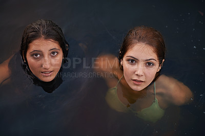 Buy stock photo Teenagers, closeup and portrait of friends swimming in lake, water and river outdoor in countryside. Young women, diversity and youth together on vacation, holiday and travel to relax in above view
