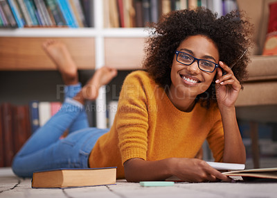 Buy stock photo Portrait, floor and African woman in library, smile and study for education. Textbooks, paper and glasses material for happy female student with natural afro hair, learning and notes for knowledge