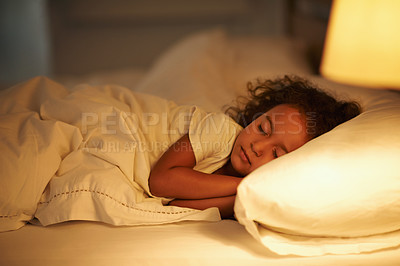 Buy stock photo A cute little girl fast asleep in a double bed