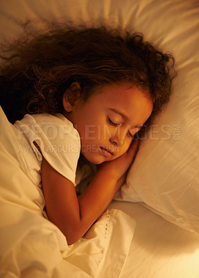 Buy stock photo Child, sleeping and top view in bed at night, comfortable and tired or dream on pillow in home. Female person, girl and resting in bedroom or lying to relax, exhausted and fatigue or peace and calm