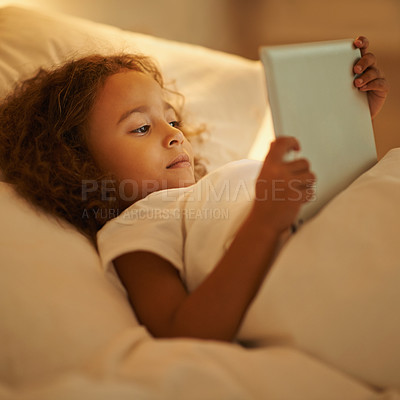 Buy stock photo Bedtime, child and tablet in bed at night, comfortable and online for games or play in home. Female person, girl and rest in bedroom or closeup to relax, website and internet or app for entertainment