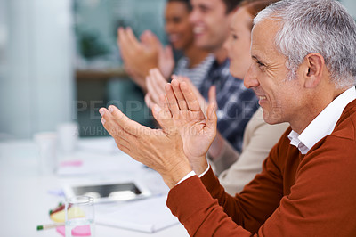 Buy stock photo Mature businessman, happy and applause in presentation in seminar and celebration by coworkers in conference room. Finance team, success or clapping hands in convention for achievement and promotion