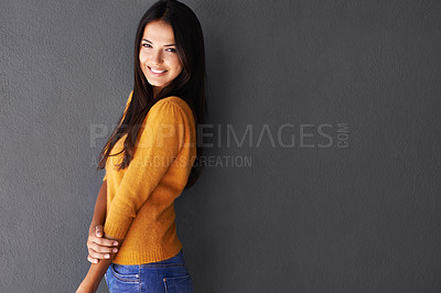 Buy stock photo Mockup space, fashion and female model in studio, portrait and cool or trendy style in gray background. Woman, smile and happy with confidence or pride, stylish or edgy in casual outfit or clothes