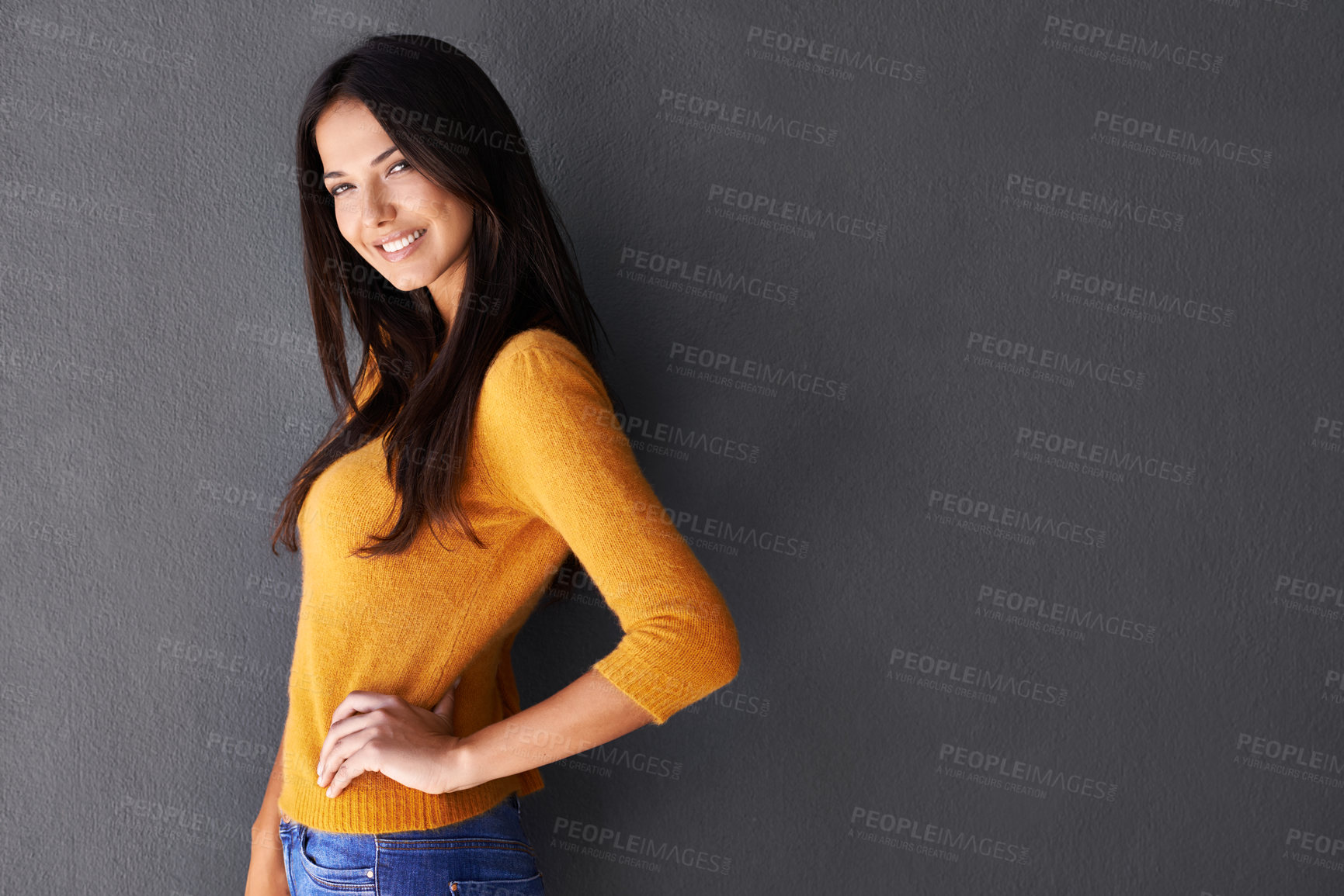Buy stock photo Portrait, trendy and female model in studio, fashion and cool style in gray background. Woman, smile and happy with confidence or pride in mockup space, stylish and edgy in casual outfit or clothes