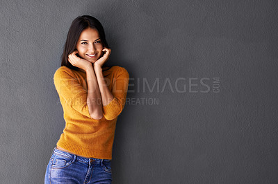Buy stock photo Fashion, female model and hands in portrait or studio, trendy or cool in gray background. Woman, smile and happy with confidence or pride in mockup space, stylish and edgy in casual outfit or clothes