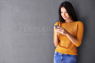 Buy stock photo Phone, search and woman in house with social media, scroll or reading sign up info on wall background. Smartphone, app and female person at home online with google it, competition or giveaway sign up