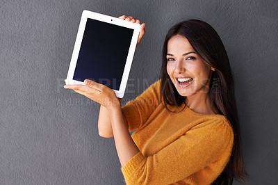 Buy stock photo Woman, portrait and tablet screen in studio, display and mockup space for website or app. Happy female person, online and blank or empty for marketing or advertising, social media and gray background