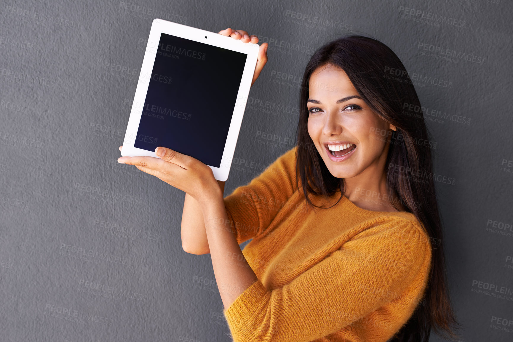 Buy stock photo Woman, portrait and tablet screen in studio, display and mockup space for website or app. Happy female person, online and blank or empty for marketing or advertising, social media and gray background