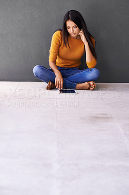 Buy stock photo App, social media and internet for woman on floor with tablet for online, web and info on weekend. Blogger or content creator with finger on screen for engagement and tech for browse and relax