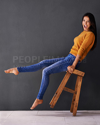 Buy stock photo Woman, smile and portrait on chair for clothes, trend and style for fashion and bold color for weekend. Female person, model and happy with jersey for casual outfit, stylish and fashionable on mockup