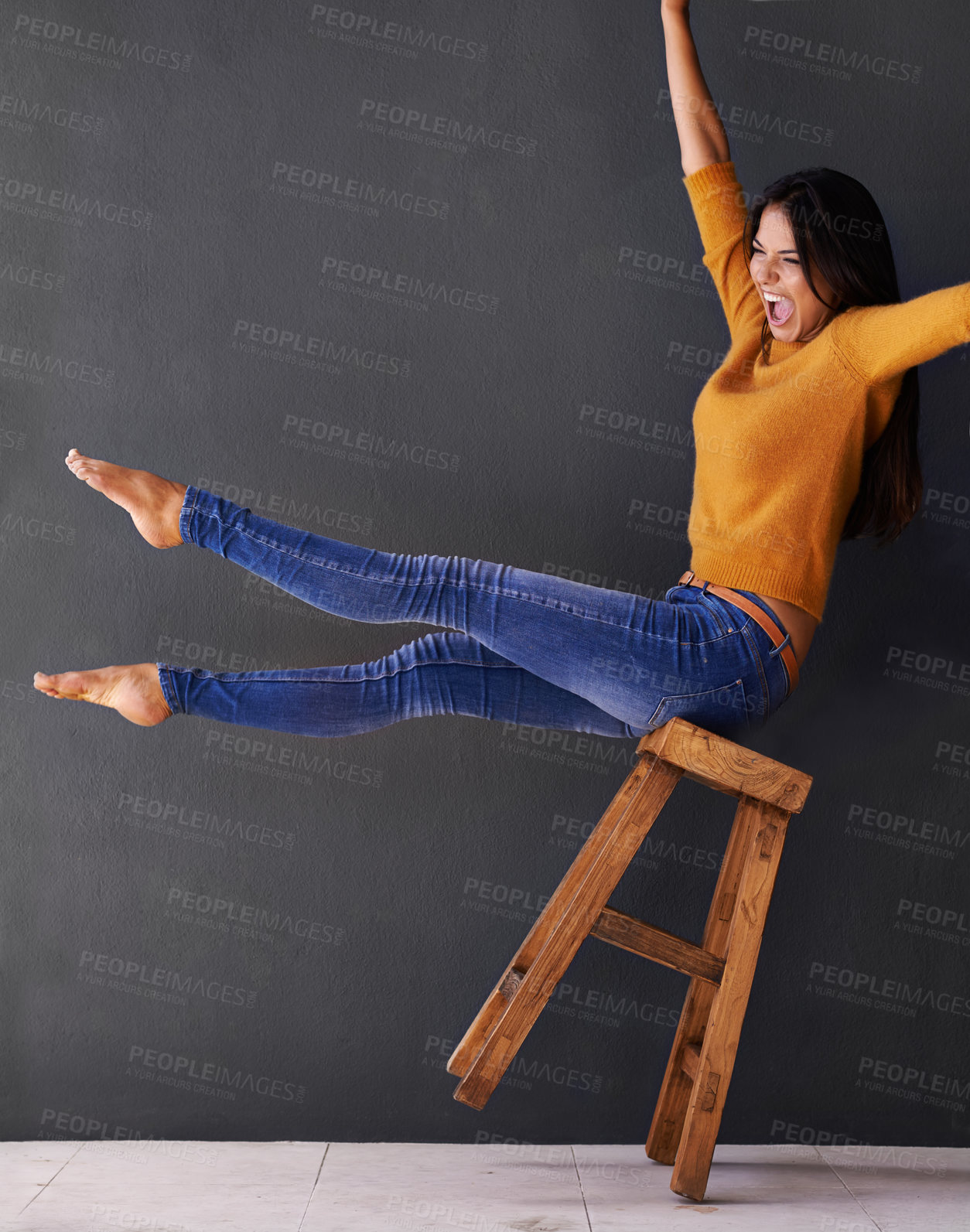 Buy stock photo Happy, chair and excited with woman in studio for  news, announcement and balance. Happiness, winner and mockup space with female person on wall background for success, celebration and energy