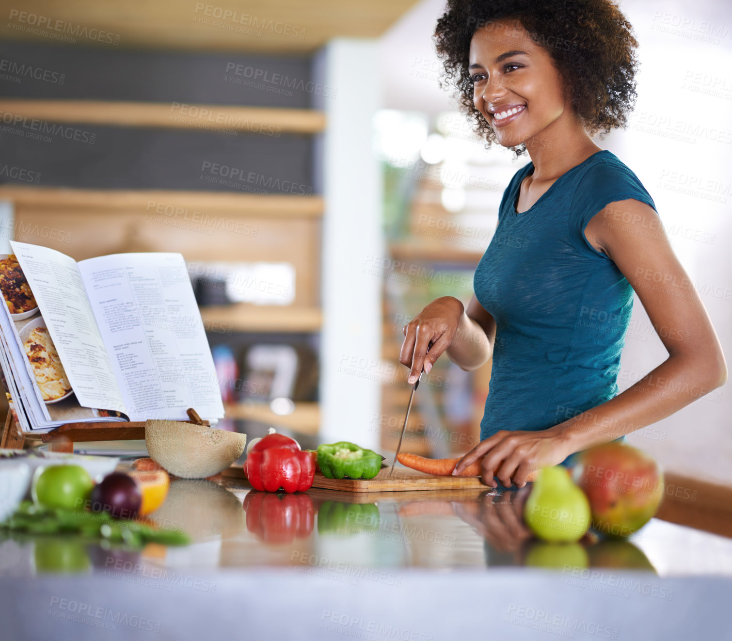 Buy stock photo Cooking, happy woman and cutting vegetables with recipe book in kitchen for healthy diet, nutrition or lunch. Chopping board, food or African person preparing salad for dinner or organic meal in home