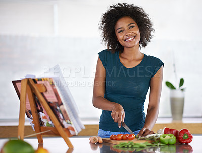 Buy stock photo Cooking, portrait and happy woman chopping vegetables with recipe book in kitchen for healthy diet, nutrition or lunch. Cutting board, food and face of African person preparing organic meal in home