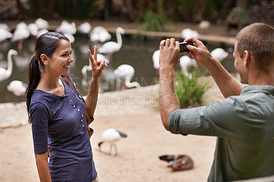 Buy stock photo Shot of a couple enjoying a day at the zoo