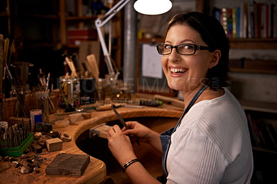 Buy stock photo An artist creating something out of wood