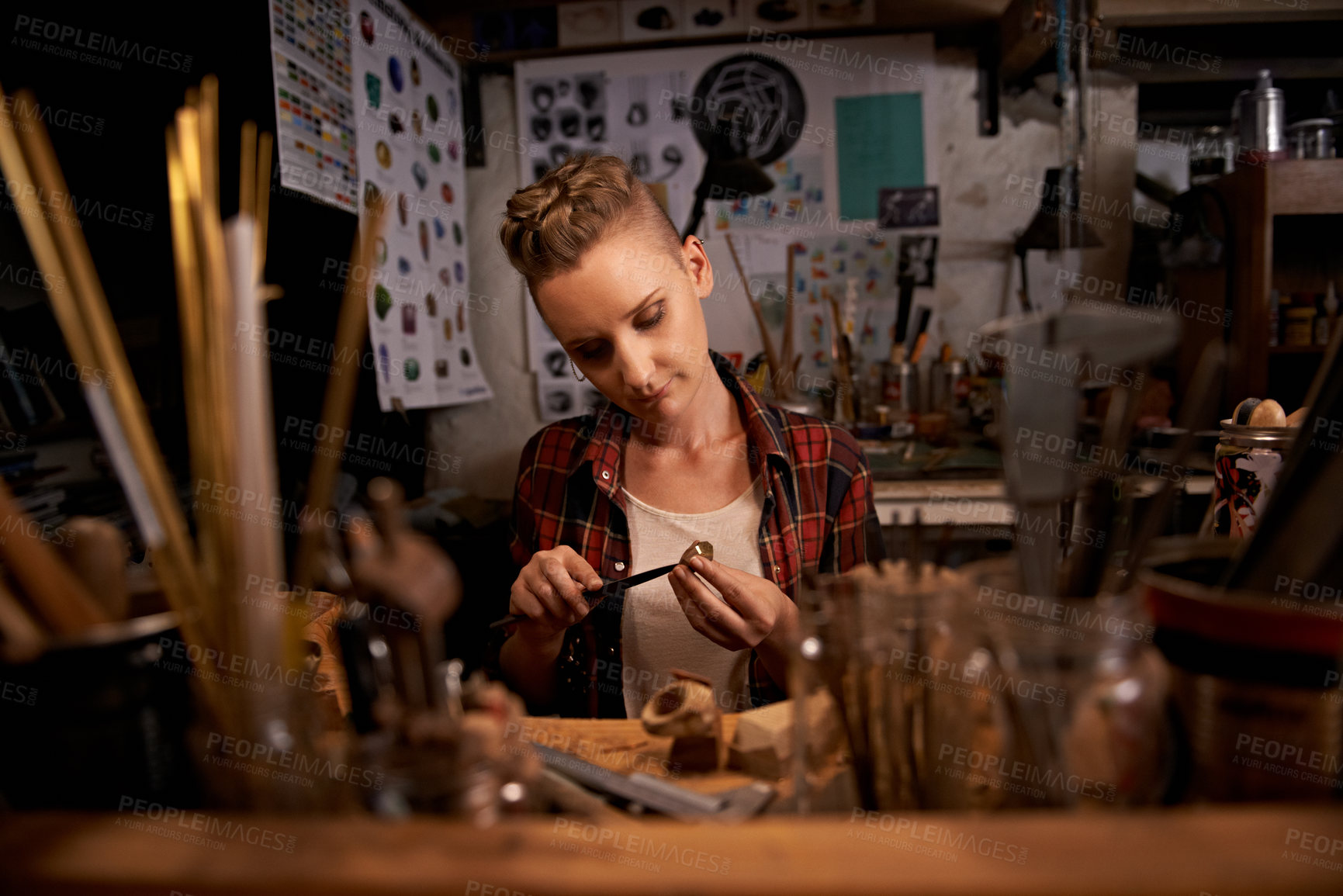 Buy stock photo Artist, woman and tools with woodwork in workshop with craftsmanship, knife and handmade design with creativity. Wood, carpenter or creative person at workspace with equipment for handicraft or hobby