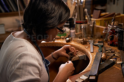 Buy stock photo Carving, wood and artist in workshop with creative project or unique sculpture on table at night. Artisan, carpenter and woman with talent for creativity in dark studio in process of woodworking