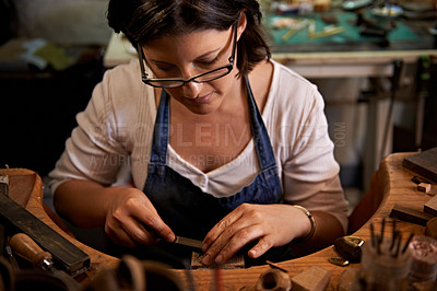 Buy stock photo Carving, wood and artist with tools in workshop for creative project or production of sculpture on table. Artisan, carpenter and woman with talent for creativity in studio in process of woodworking