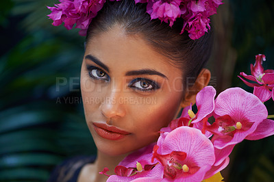 Buy stock photo Jungle, portrait or woman with flowers for skincare, natural beauty or wellness in nature aesthetic. Color, Indian person or face of model with at eco friendly cosmetics, plants or spring floral art 